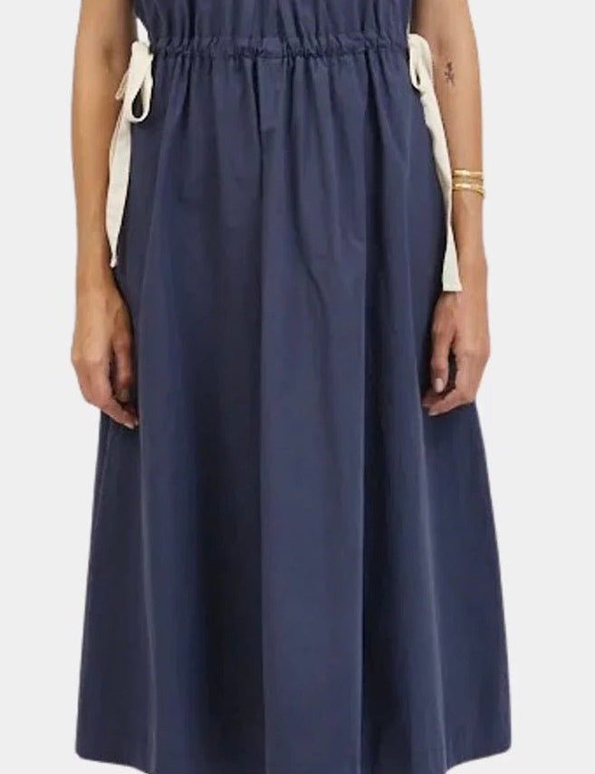 Classic Navy Maxi Dress, a navy gathered-waist dress, worn front view