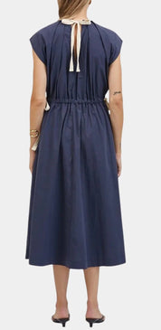 Back view of the Classic Navy Maxi Dress, a navy gathered-waist dress – Lady & Tucker