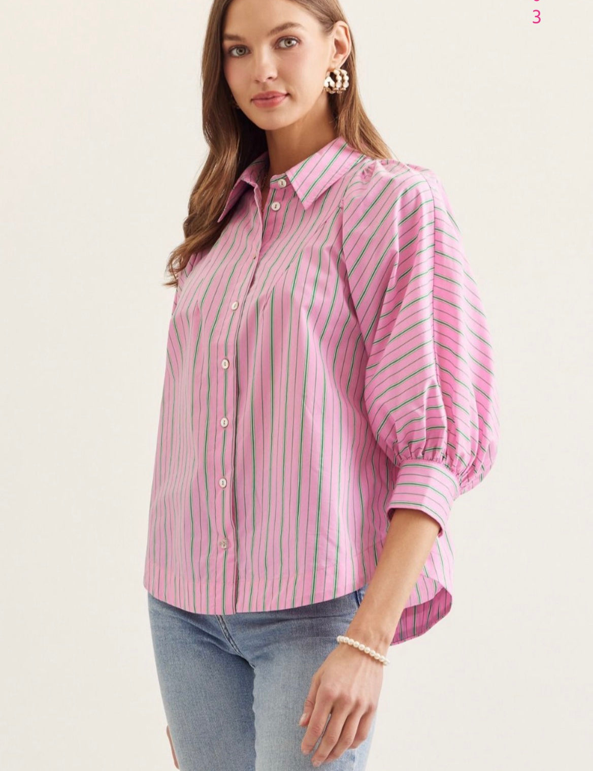 Back view of the Palm Court Stripe Top, a striped puff sleeve collared top
