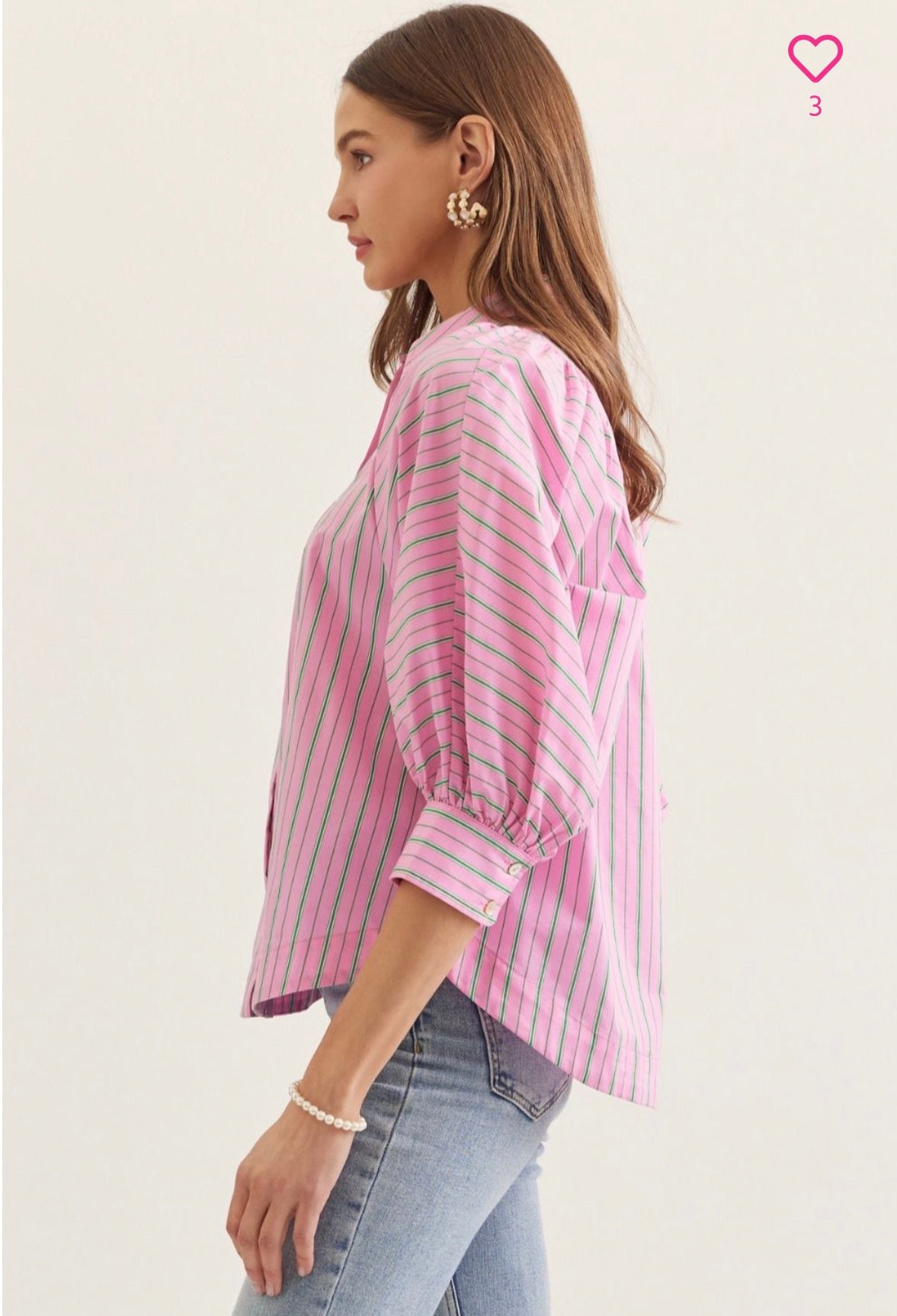 Close-up of the gathered shoulders and puff sleeves on the Palm Court Stripe Top