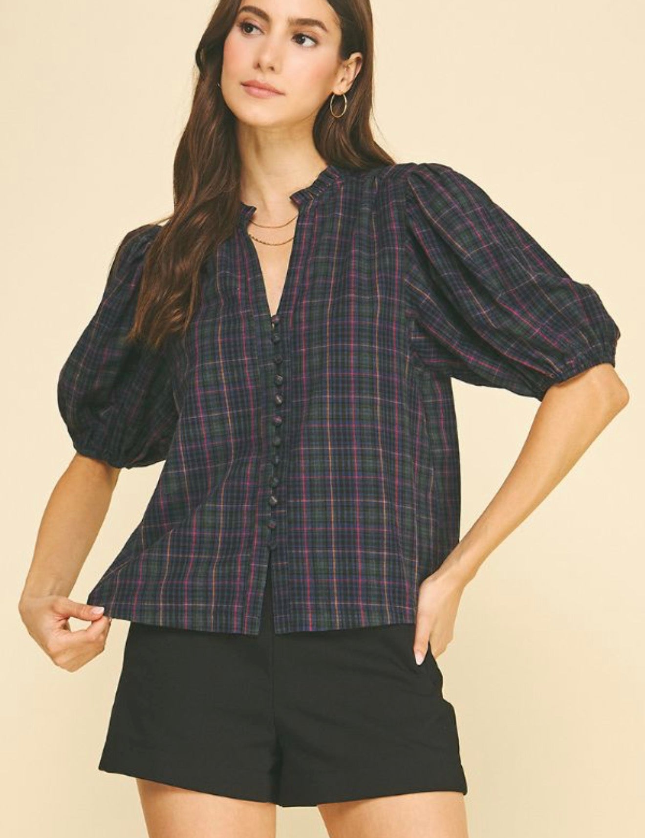 Laney Top, a plaid ruffle-neck puff sleeve blouse, worn front view – Lady & Tucker