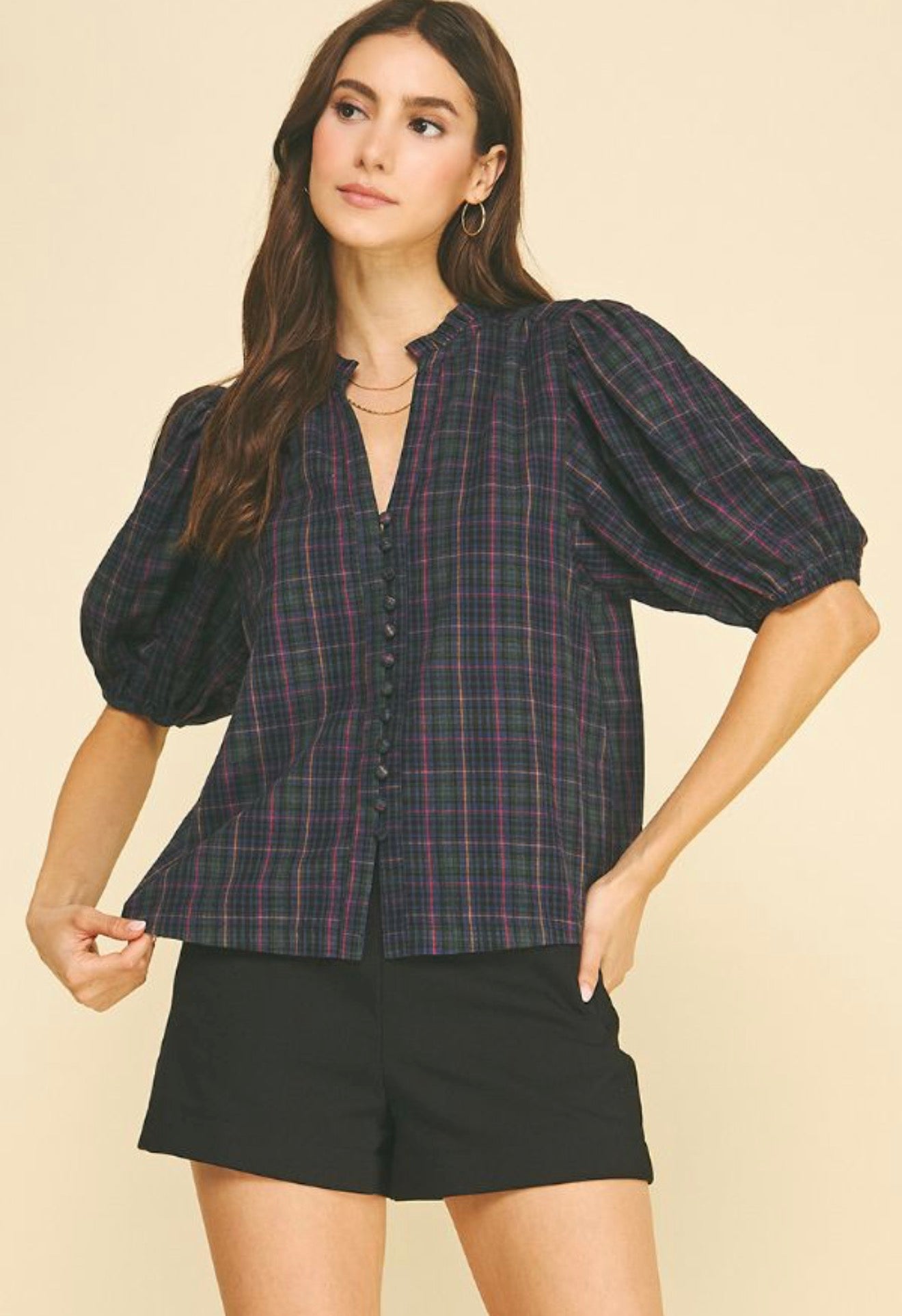 Laney Top, a plaid ruffle-neck puff sleeve blouse, worn front view – Lady & Tucker