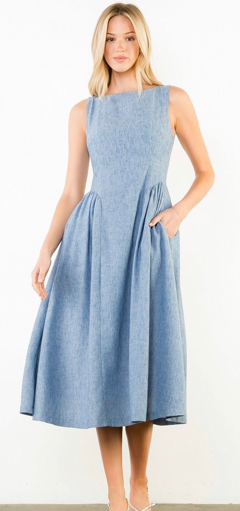 Daily Denim Dress, a powder blue chambray bateau-neck midi, worn front view