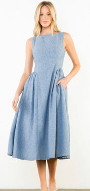 Daily Denim Dress, a powder blue chambray bateau-neck midi, worn front view