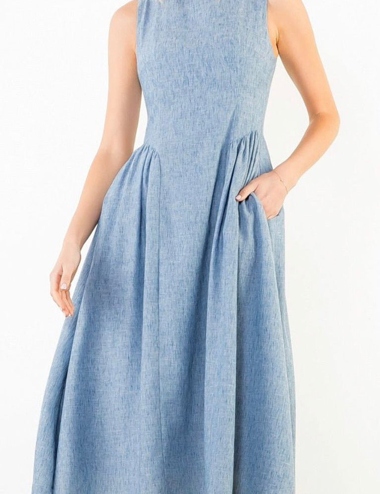 Daily Denim Dress, a powder blue chambray bateau-neck midi, worn front view