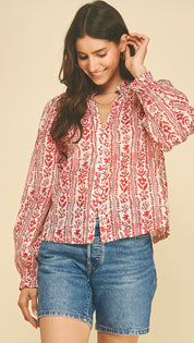 Back view of the Red Bubble Top, a red floral block-print bubble blouse