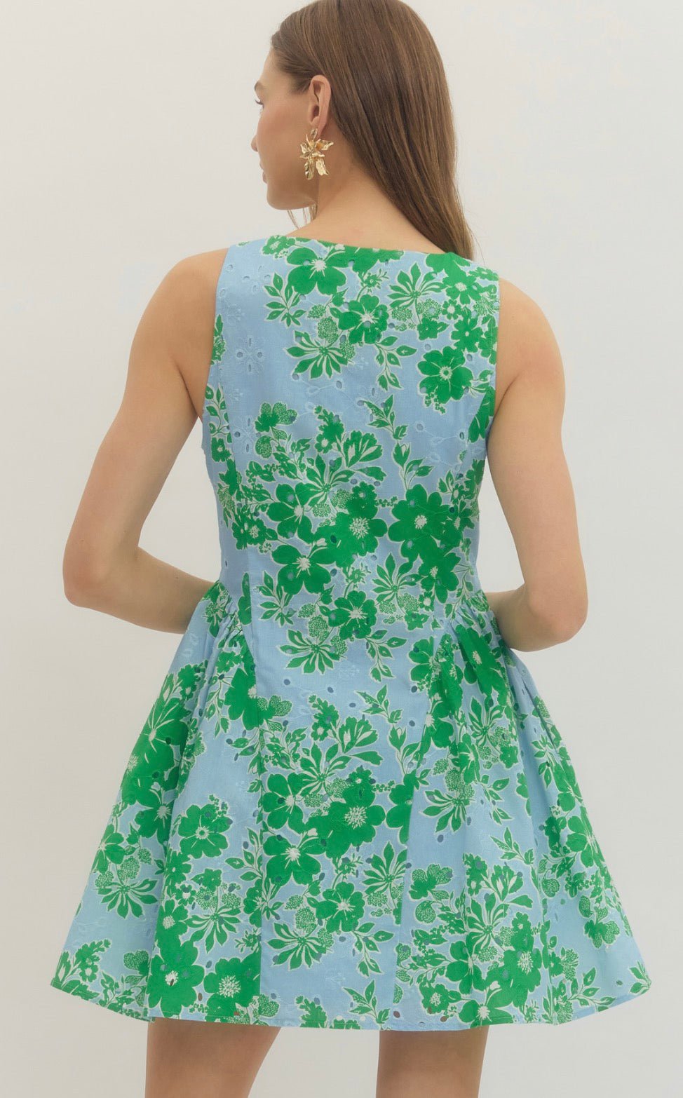 Back view of the Garden Party Dress, a sky blue dress with emerald floral print – Lady & Tucker
