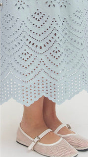 Sky Blue Eyelet Skirt shown on model, another view of a light blue eyelet midi skirt – Lady & Tucker