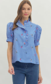 Brenda Rose Top, a sky blue pinstripe preppy blouse, worn front view