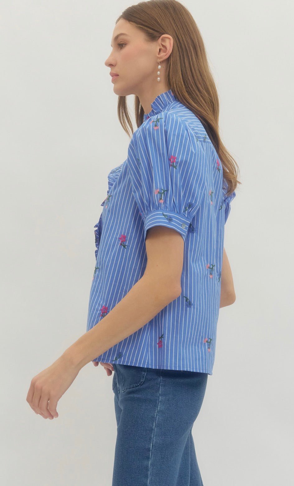 Back view of the Brenda Rose Top, a sky blue pinstripe preppy blouse