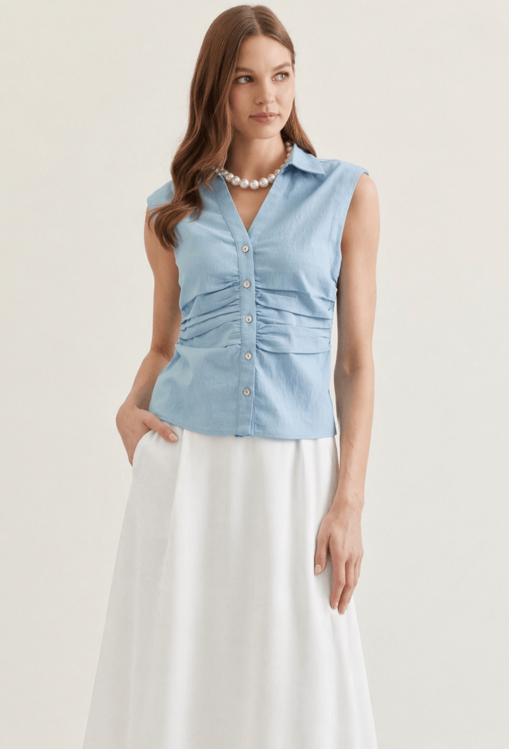 Denim Top, a sleeveless button-front denim top, worn front view