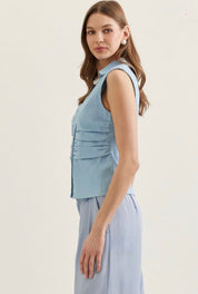 Back view of the Denim Top, a sleeveless button-front denim top
