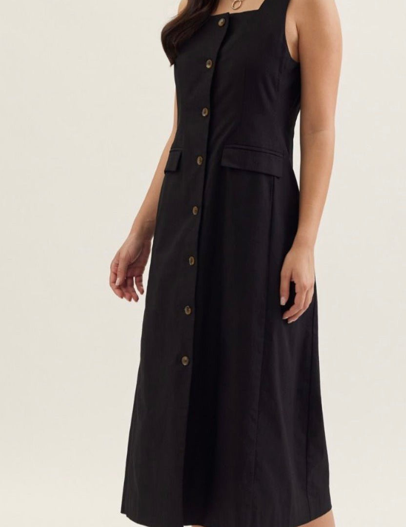 Back view of the Monaco Dress, a sleeveless square-neck midi dress