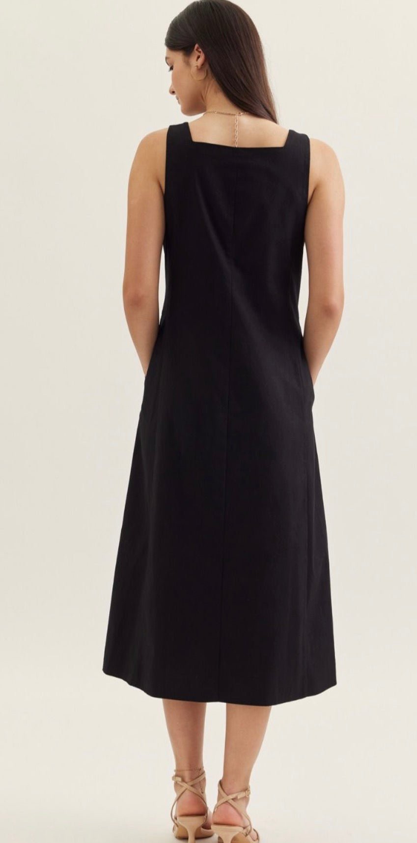 Close-up of the button front and flap pockets on the Monaco Dress