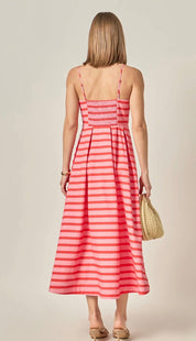 Side view of the Pretty In Stripes Dress showing the pleated skirt and straight neckline – Lady & Tucker