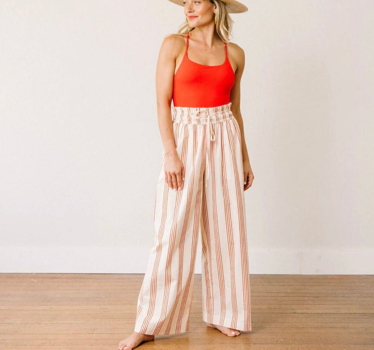 Close-up of the cherry pinstripe pattern on the Cherry Pinstripe Pant/Top Set – Lady & Tucker