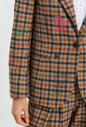 Close-up of the embroidered phrases and hearts on the Graffiti Plaid Jacket