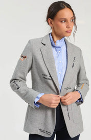 Light Gray Printed Jacket, a gray herringbone printed blazer, worn front view