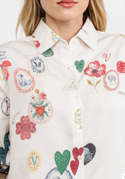Close-up of the romantic artistic print on the Puppy Love Shirt