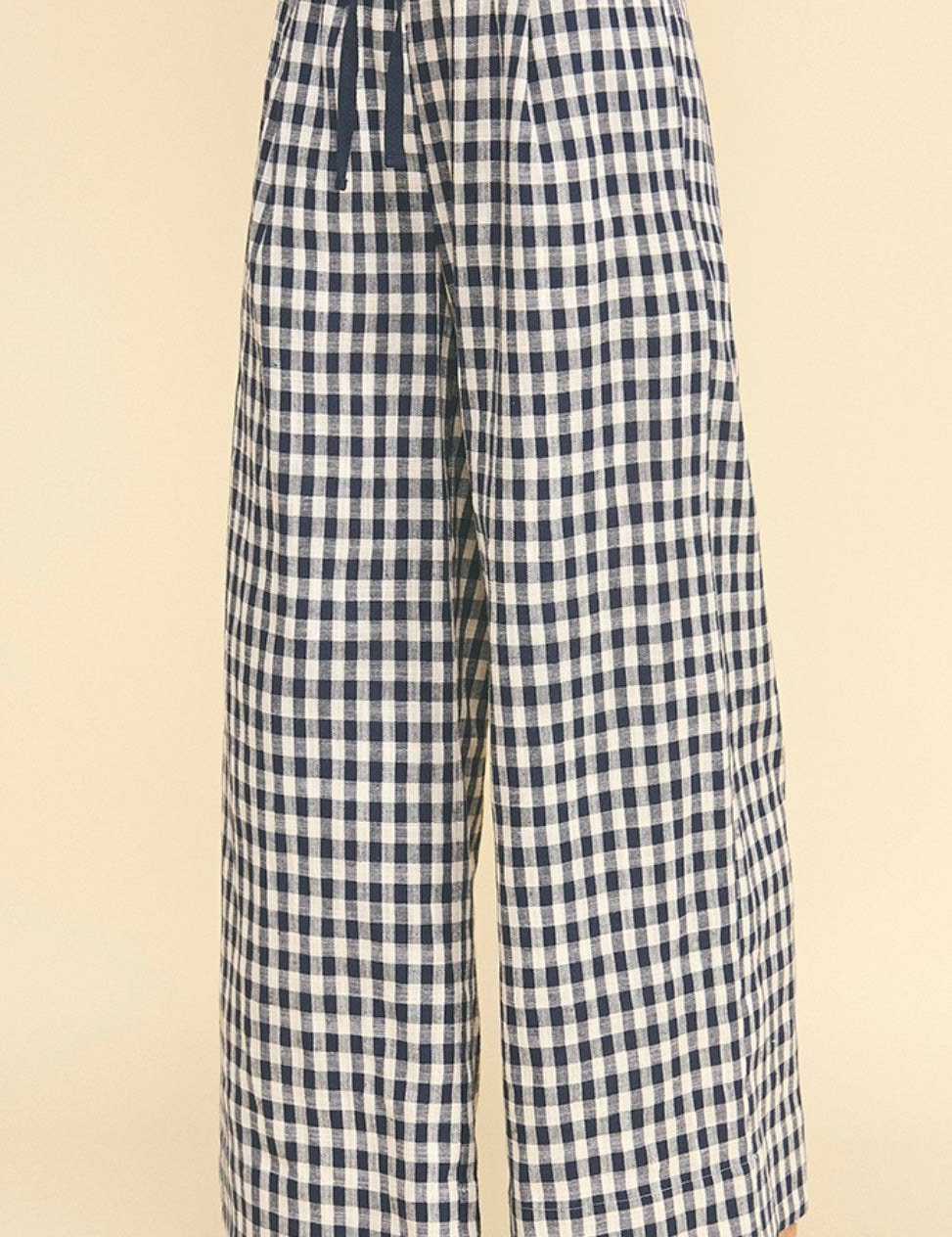 Back view of the Gingham Pants, wide-leg gingham pants with an elastic waist