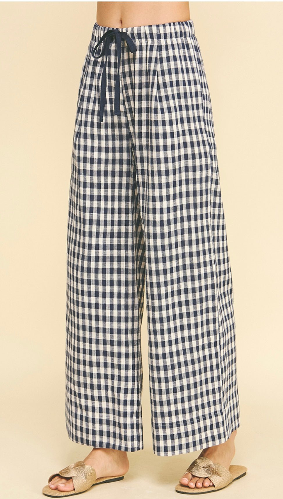 Back view of the Gingham Pants, wide-leg gingham pants with an elastic waist
