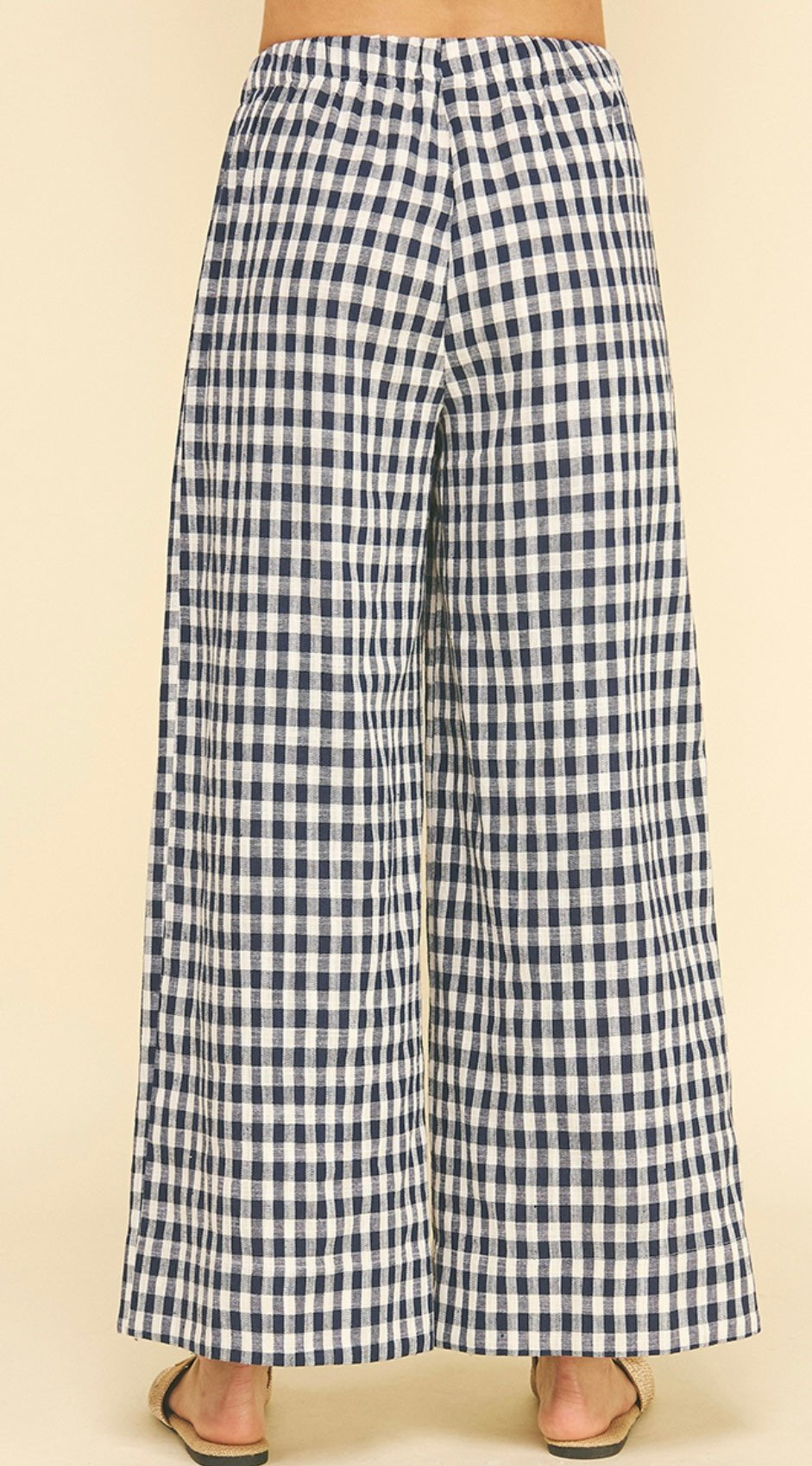 Close-up of the gingham check and side pockets on the Gingham Pants