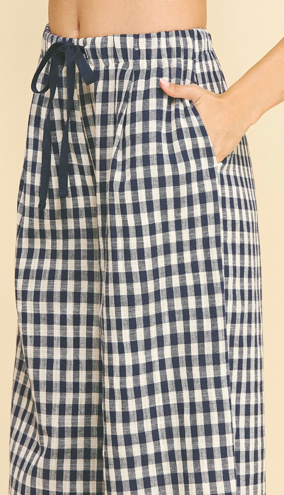 Side view of the Gingham Pants showing the gingham check and side pockets – Lady & Tucker