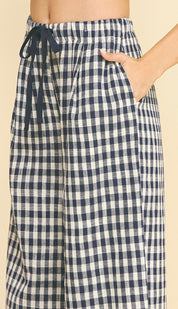 Side view of the Gingham Pants showing the gingham check and side pockets – Lady & Tucker
